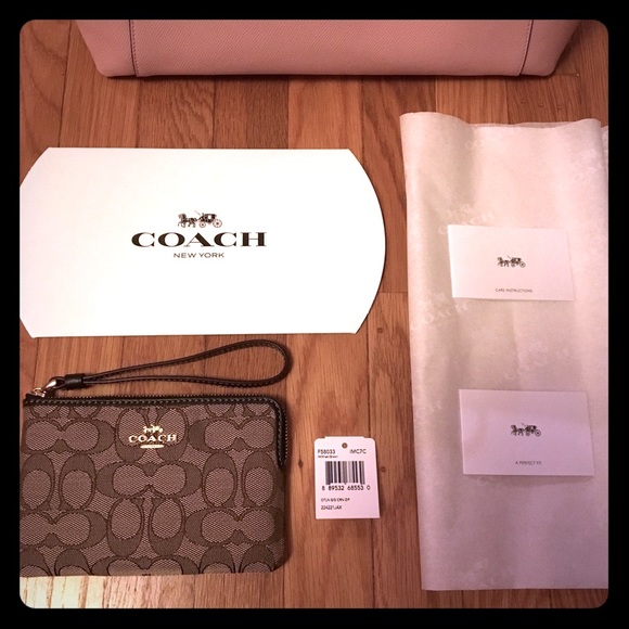 Coach Handbags - New with tag Coach Wallet Wristlet! Brown logo NWT